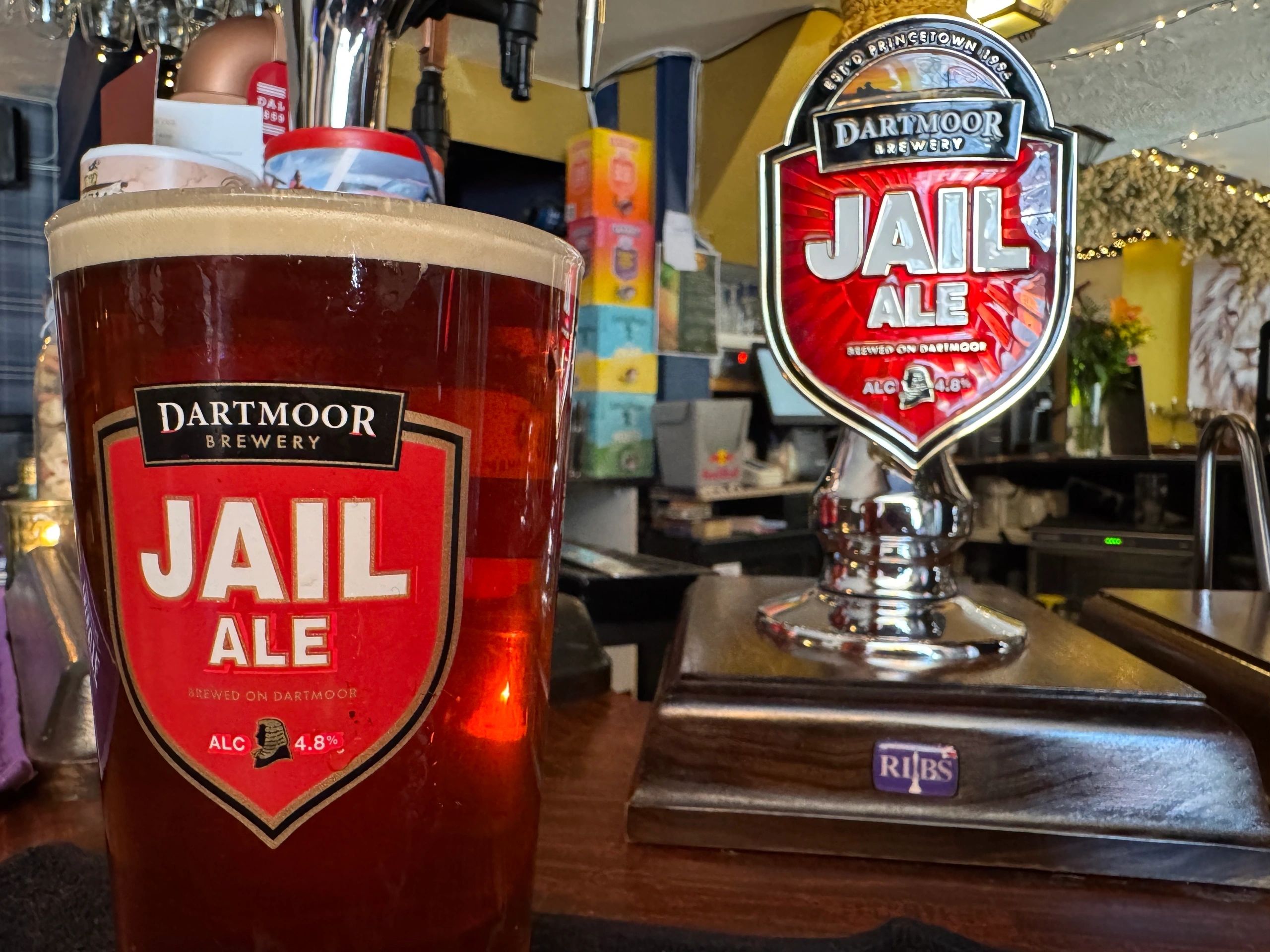 Real ale cask pumps at the bar